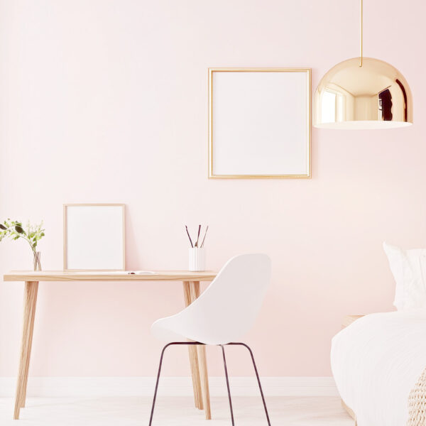 Image of a pretty bedroom with simple styling, creating a modern, feminine aesthetic by Spark & Bright. Pretty room makeovers for short-stay rentals.